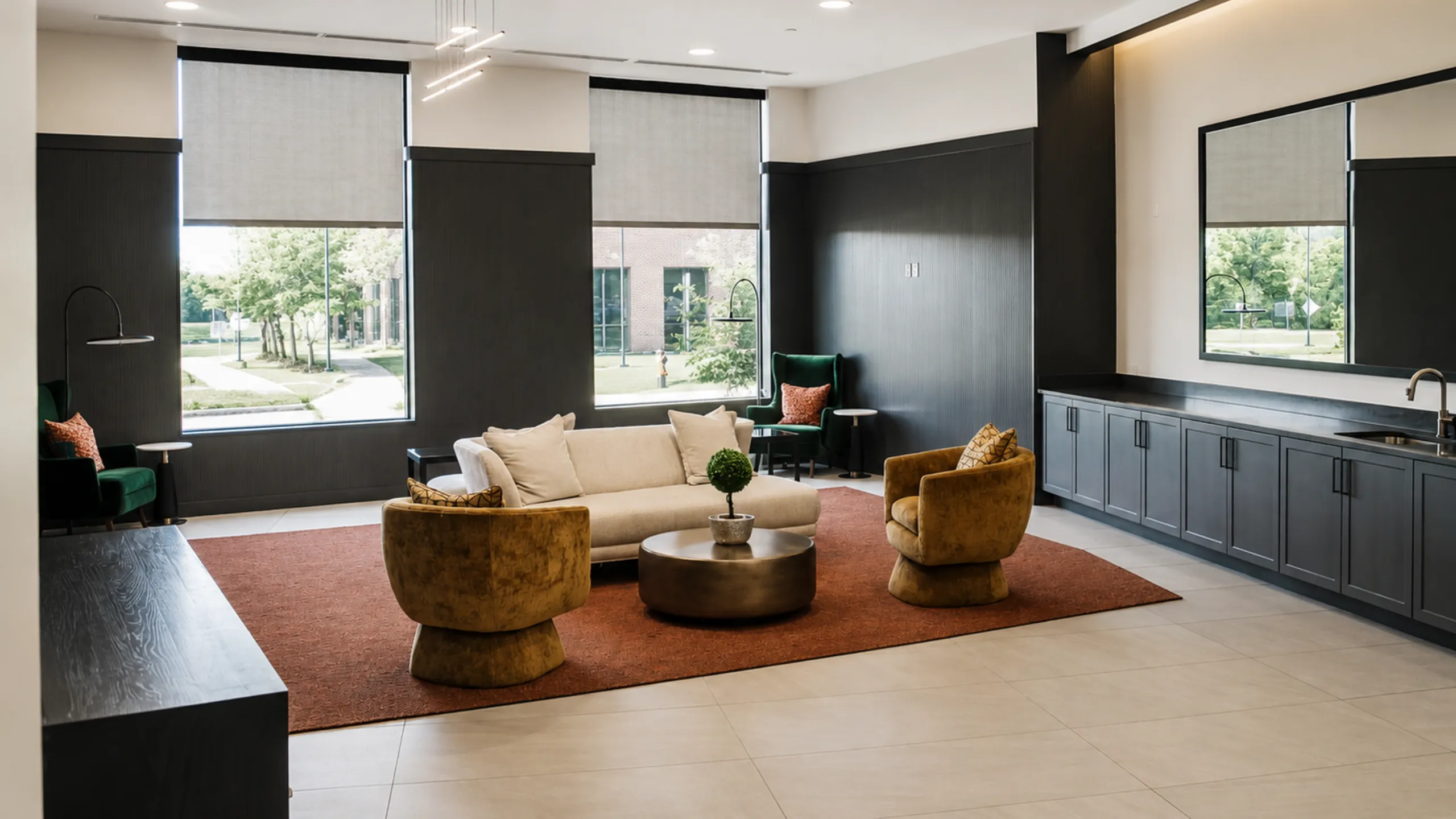 Modern lounge area with plush seating, elegant decor, and abundant natural light through scenic windows.