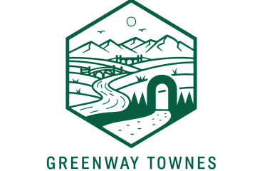 Charming Greenway Townes logo featuring a scenic landscape with winding paths, bridges, and mountain views.