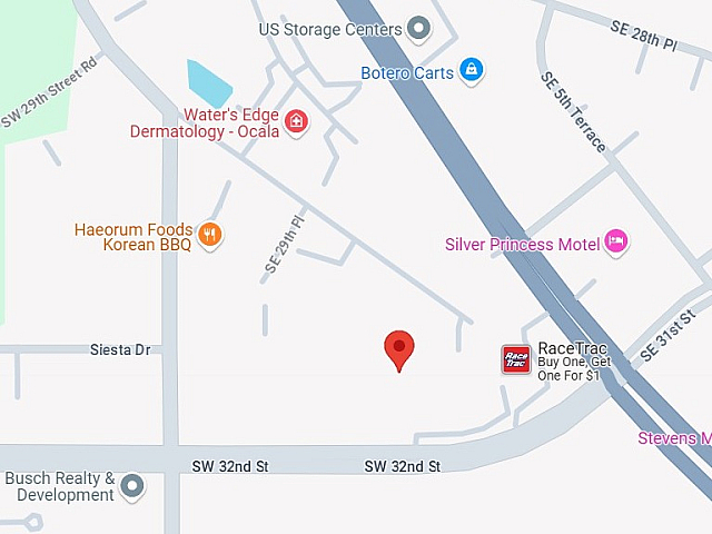 Illustrative map highlighting a central location with nearby amenities including restaurants and motels.