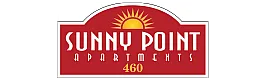 Bright and inviting Sunny Point Apartments logo featuring a vibrant sun graphic over a bold red background, highlighting the number 460.