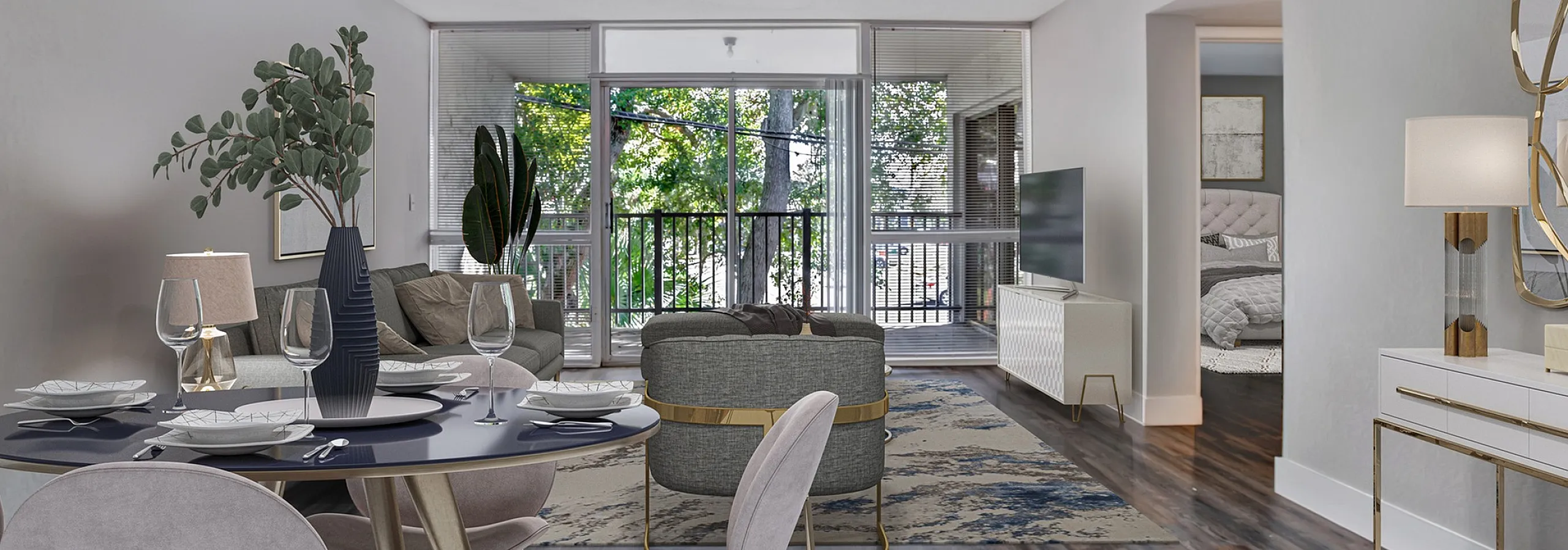 Modern open-concept living and dining area with elegant decor, large windows, and access to a lush balcony view.
