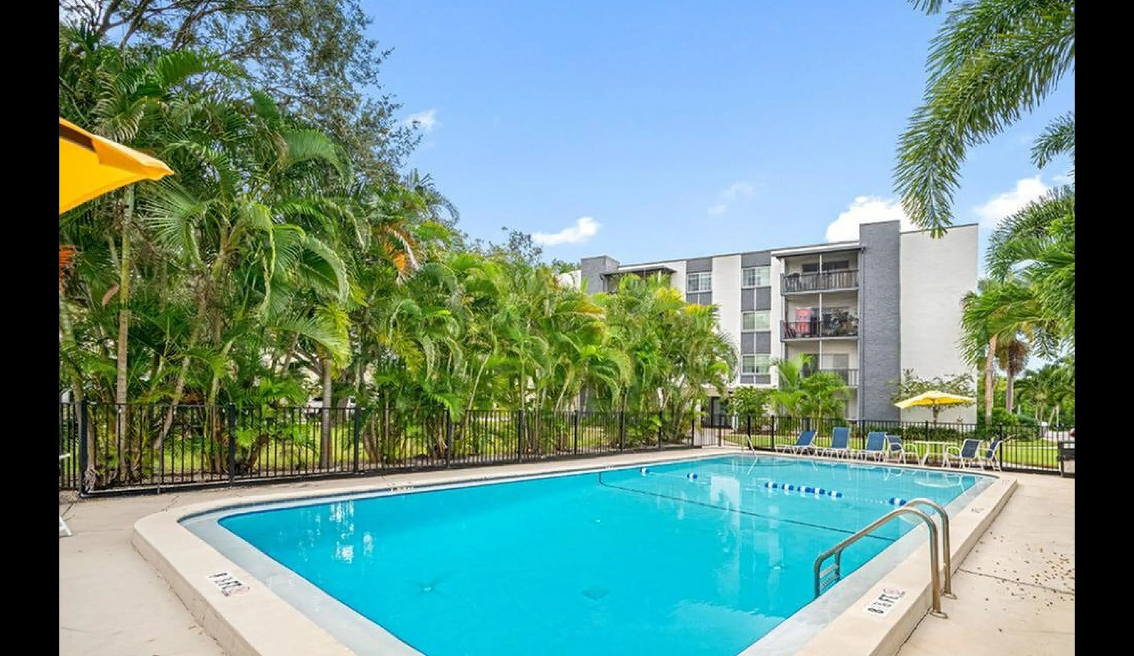 Pool and sun deck at Nordica Bay apartments