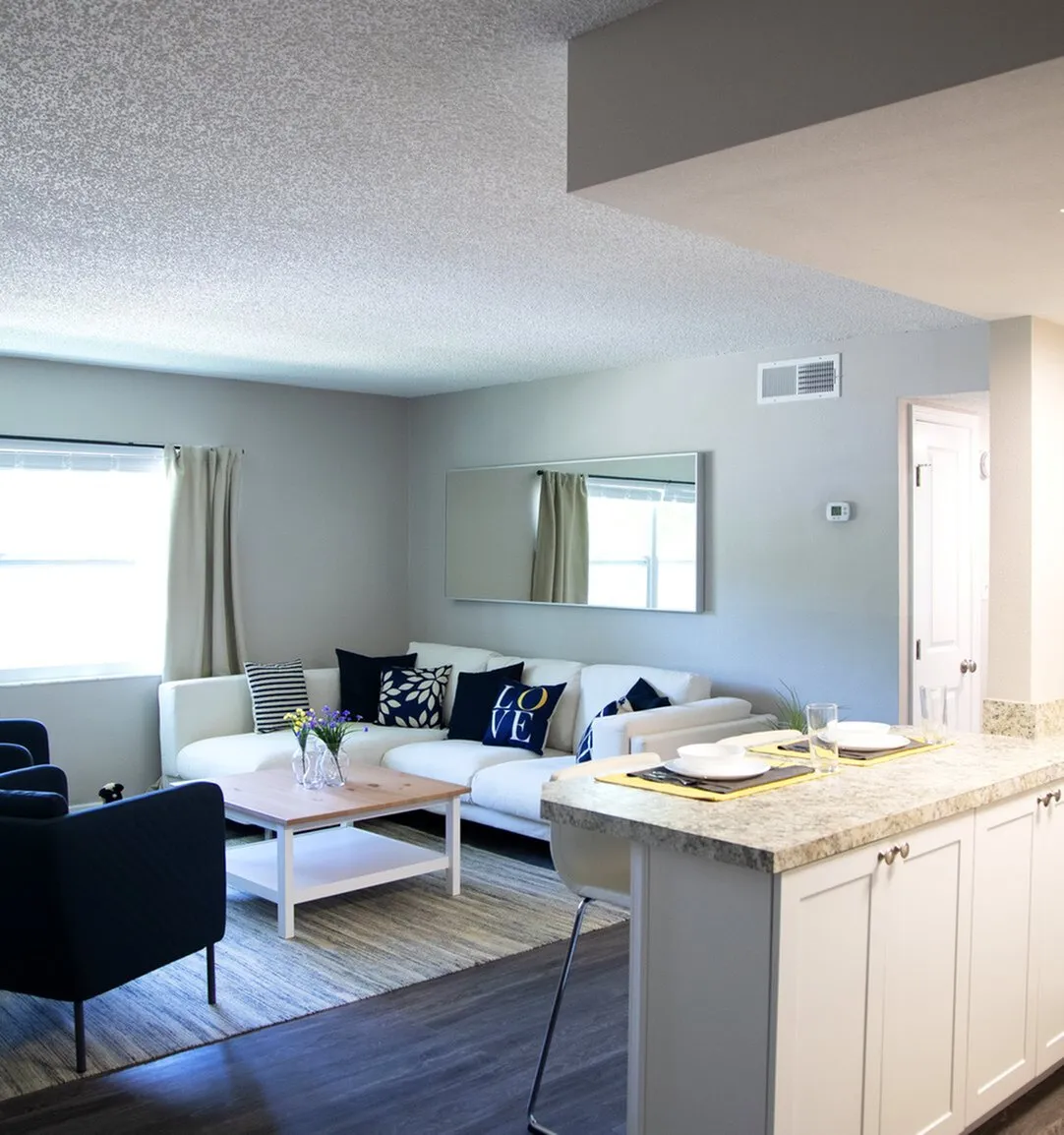 Renovated living room and kitchen at Nordica Flats.