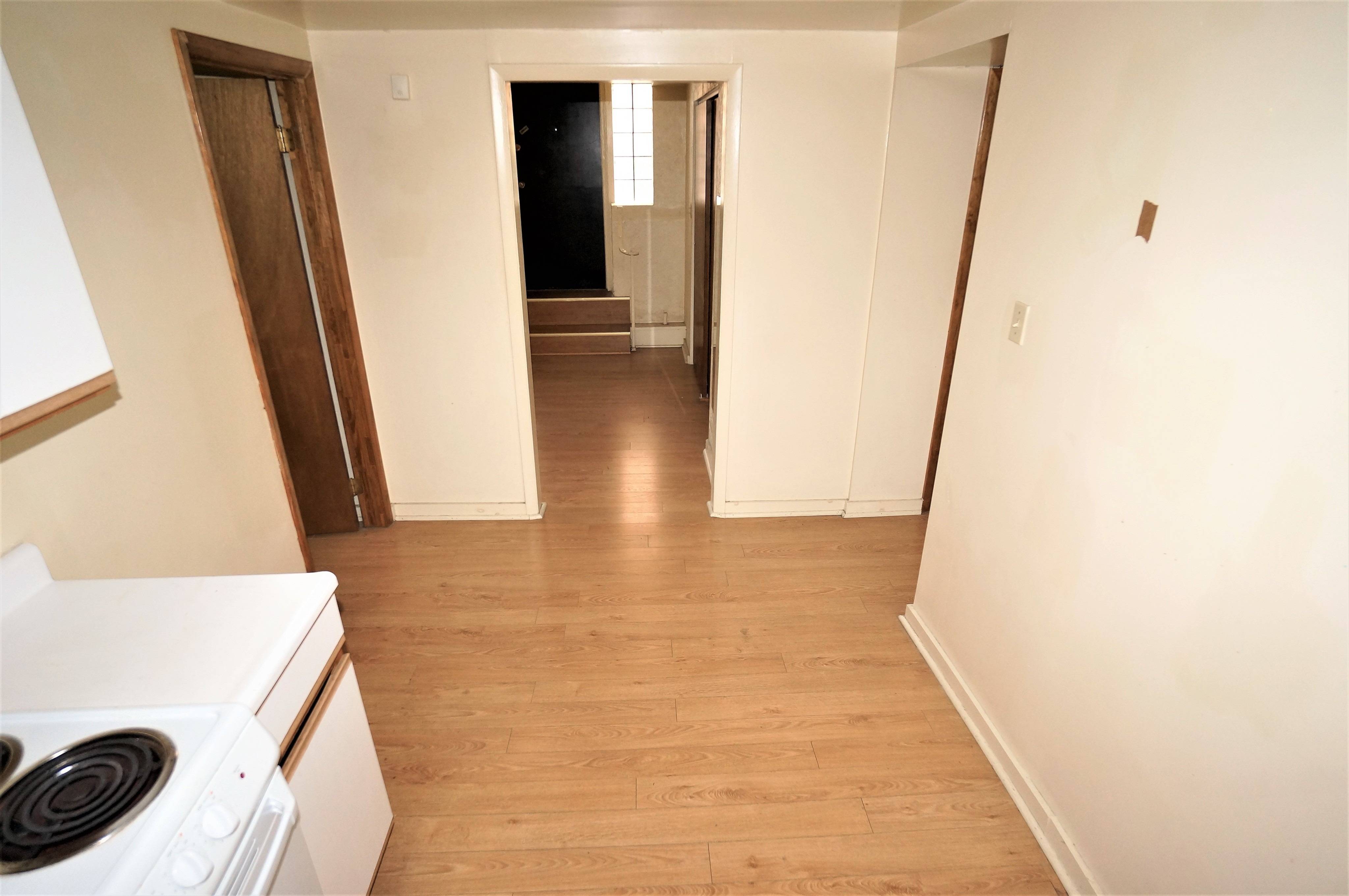 Hallway that connects the kitchen, bedrooms and living room