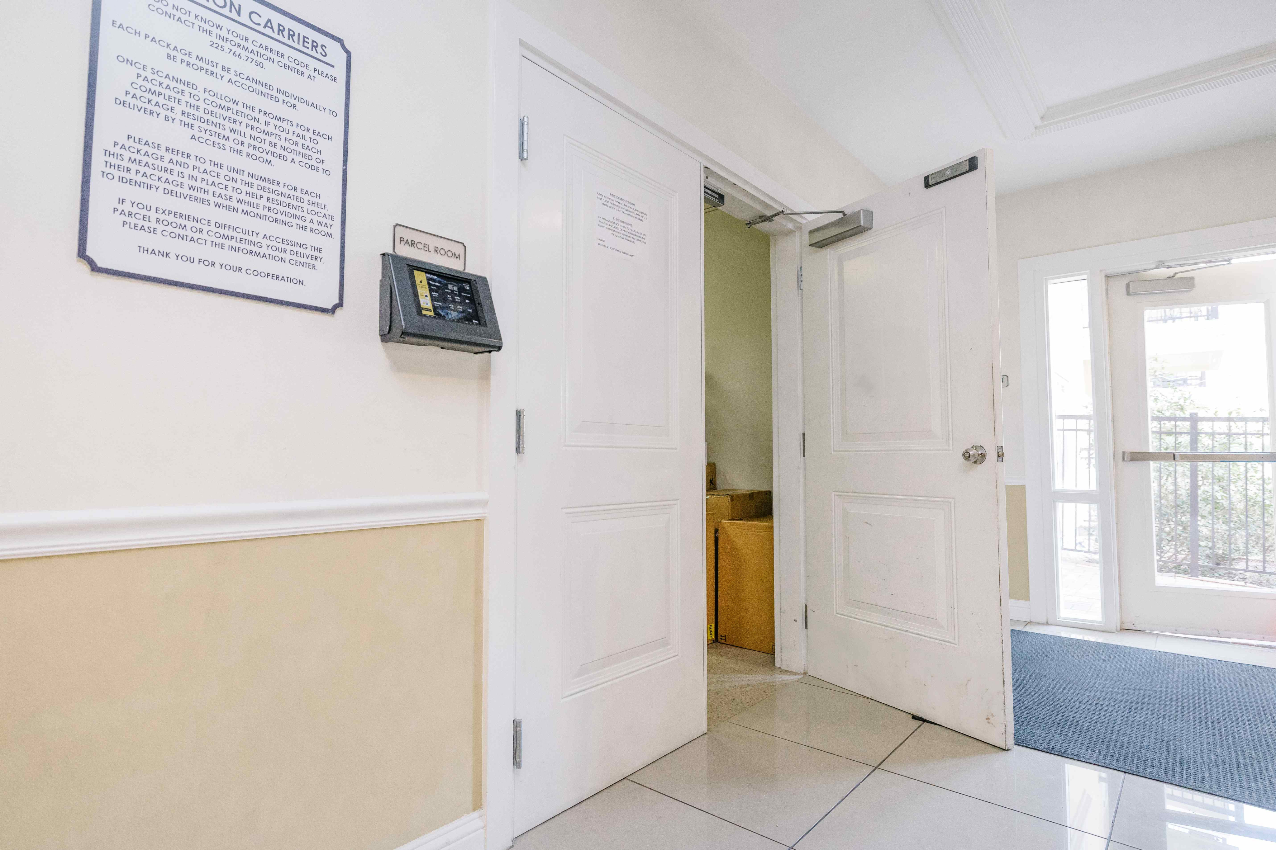 Bright and secure parcel room with modern delivery system and convenient access for residents.