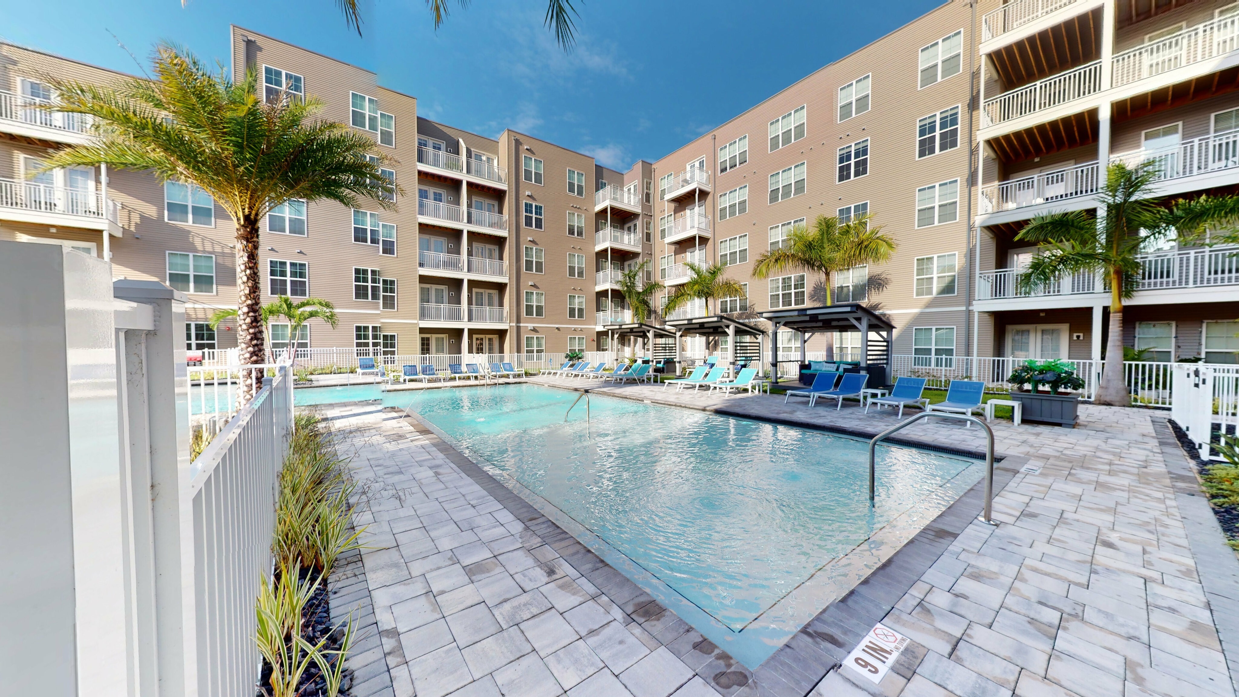 Enjoy the sun by our resort inspired pool