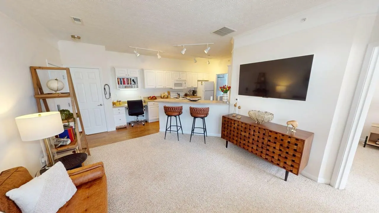 Relax and unwind in your spacious living room—perfect for hanging out and enjoying every moment.