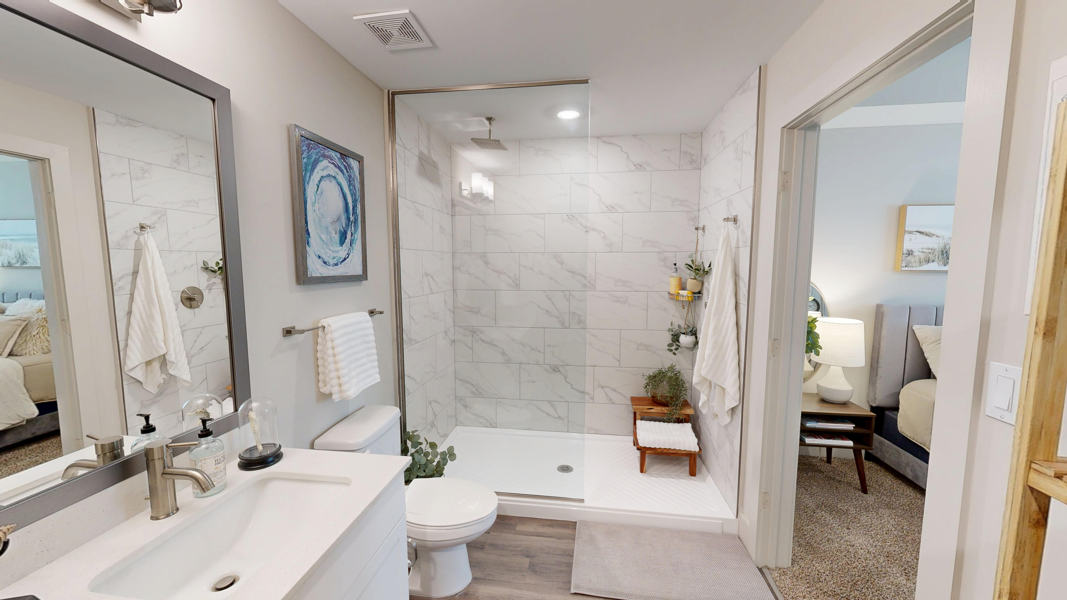 Walk-In shower with waterfall shower head in all of our homes at Triton Cay Fort Myers