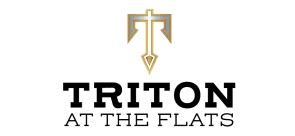 Elegant Triton at The Flats logo featuring a sophisticated shield design with bold lettering.
