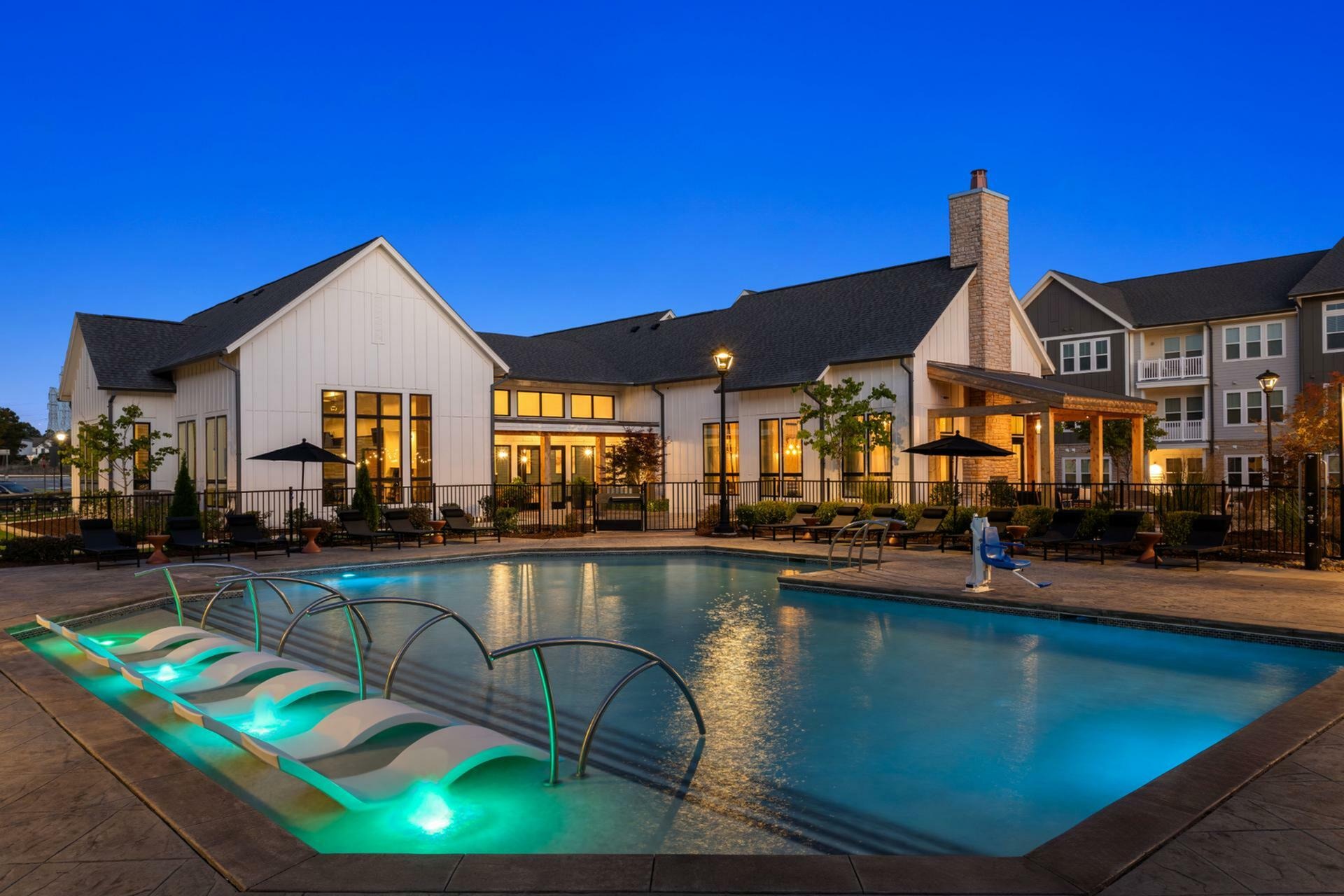 Chestnut Farm Apartments dusk pool courtyard - Matthews, NC