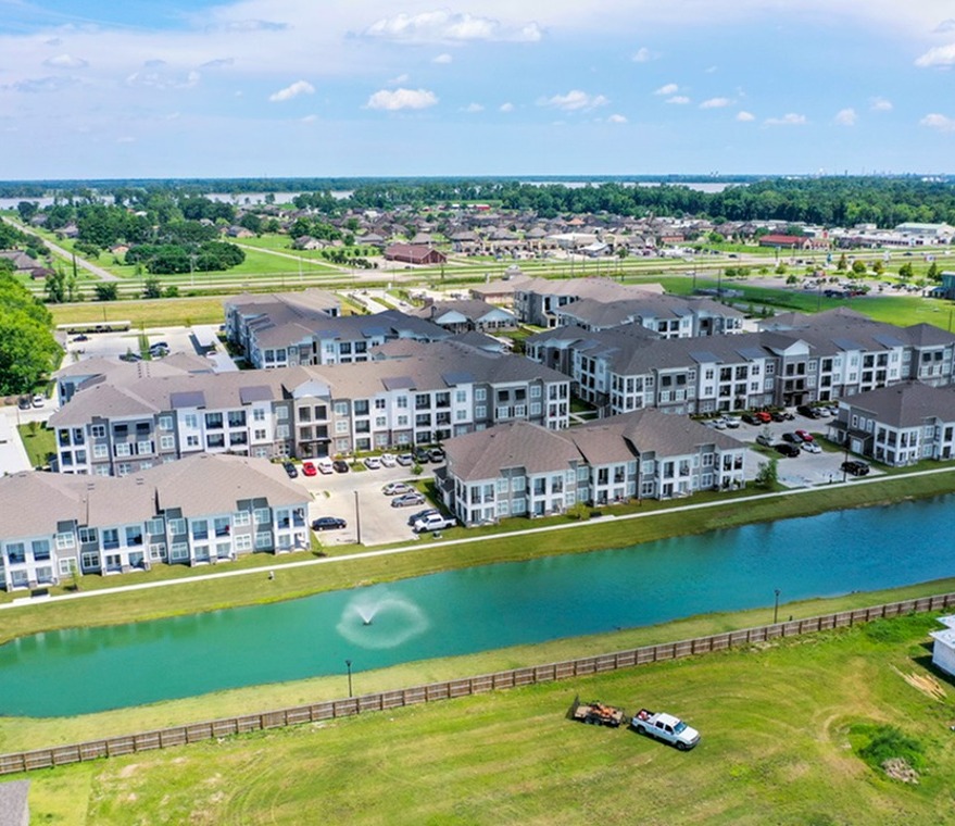 Lake with Walking Path and Green Space at Sweetwater Apartments in West Baton Rouge, LA