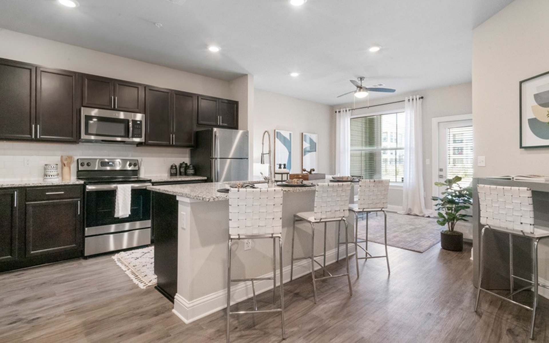 Open Floor Plan with Kitchen Island Sweetwater Apartments in West Baton Rouge, LA