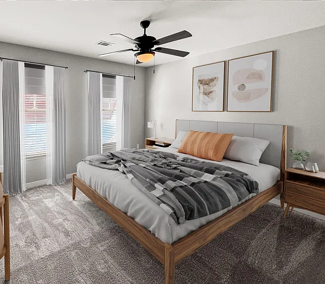 Bright and airy bedroom with modern furnishings, featuring a cozy bed, stylish ceiling fan, and elegant wall art.