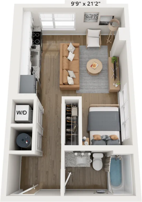 Chic studio apartment floor plan showcasing an open living area with a comfortable sofa, modern kitchen, cozy bed space, and convenient in-unit laundry. Perfect compact living solution.