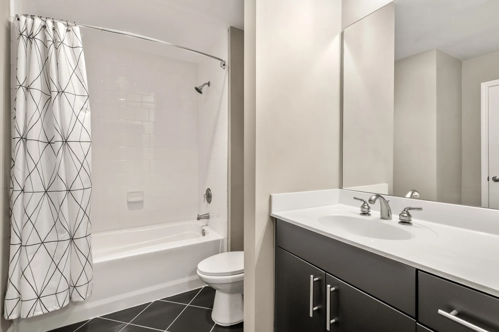 Bathroom with tub and sink