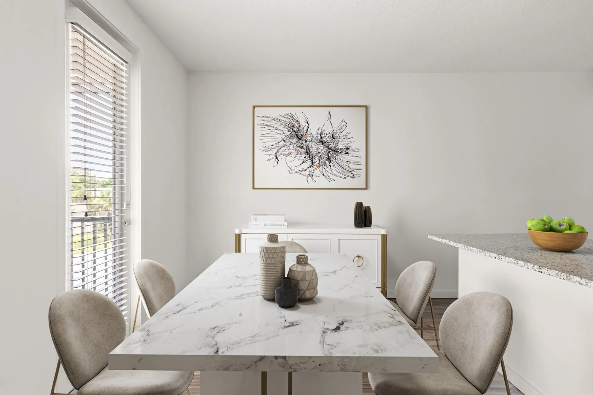 Furnished dining area with dining table, window, and view of kitchen island