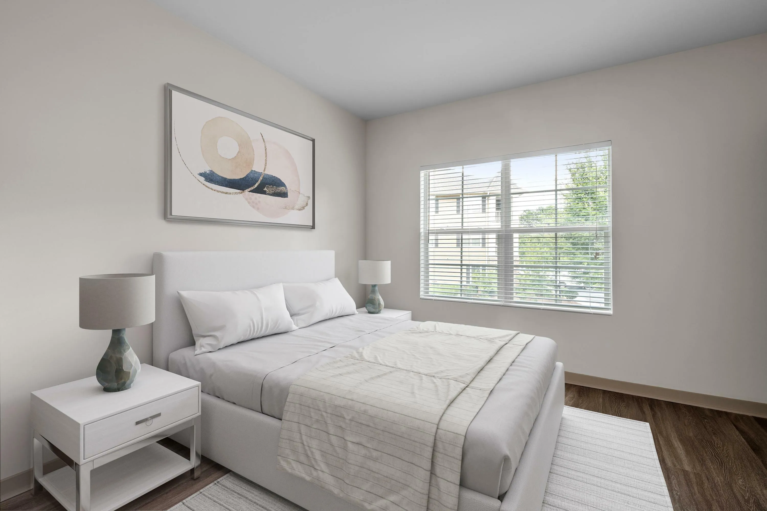 Bright and serene bedroom with a comfortable bed, modern decor, and large window offering a view of lush greenery.
