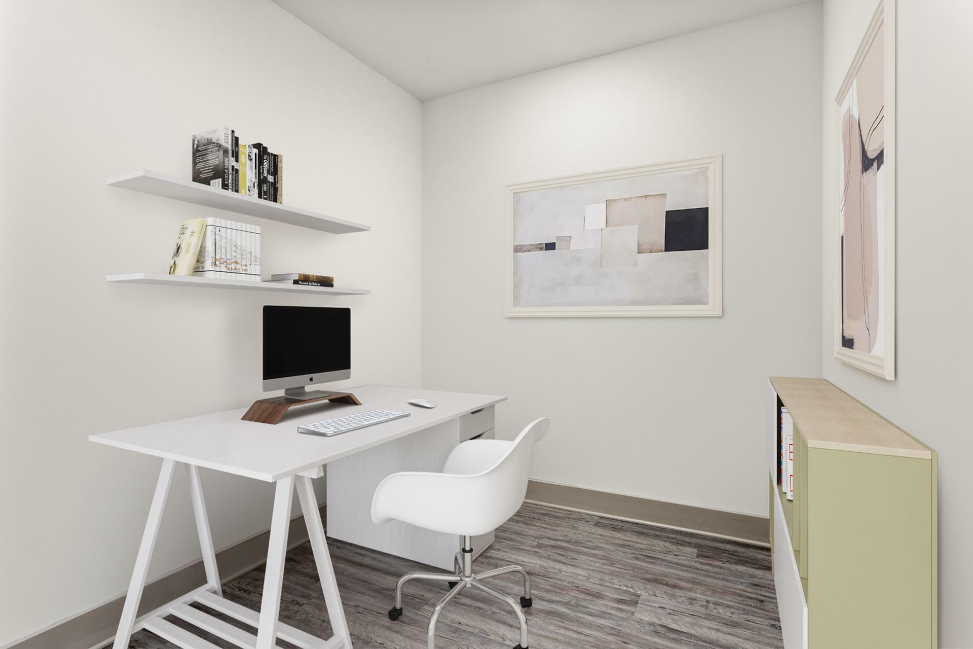 Modern home office with sleek white desk, ergonomic chair, floating shelves with books, and abstract wall art; ideal for productivity.