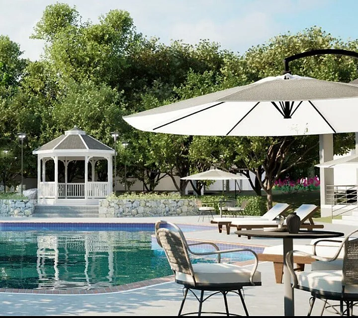 Luxurious outdoor pool area with elegant loungers, a charming gazebo, and lush greenery, offering a serene getaway.