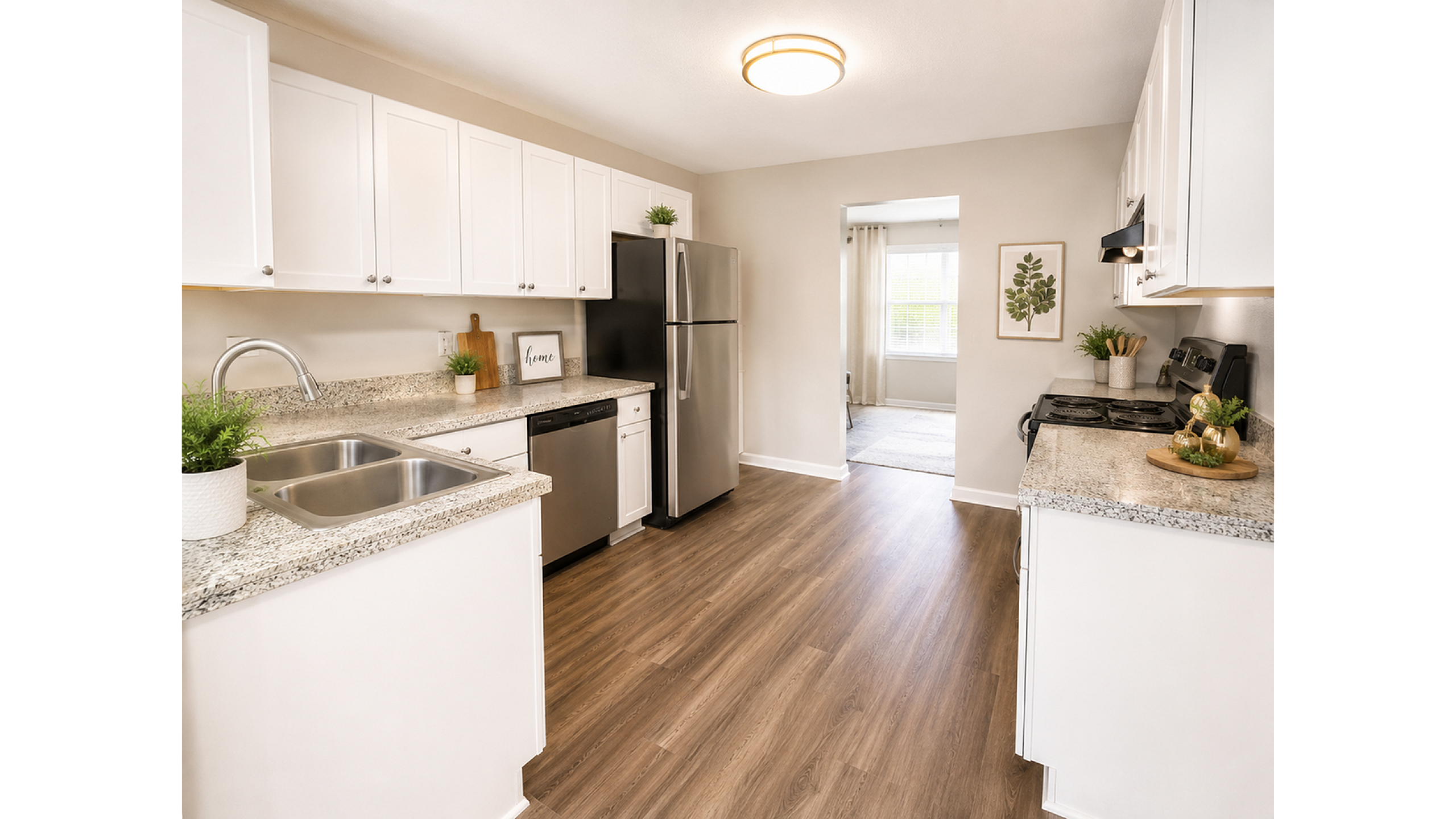 Bright and inviting kitchen with modern appliances, sleek granite countertops, and elegant cabinetry, perfect for culinary enthusiasts.