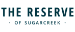 Logo of The Reserve of Sugarcreek featuring elegant and modern typography, suggesting a premium residential community.