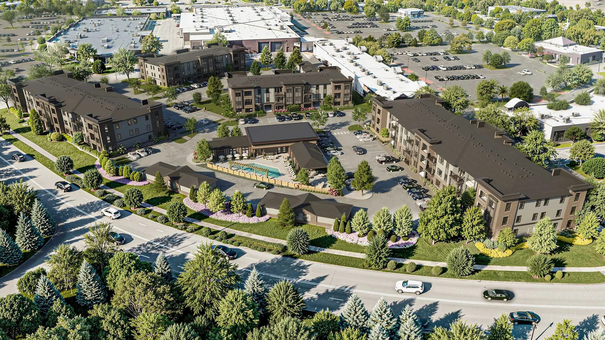 Beautiful aerial view of a modern apartment complex surrounded by lush greenery, ample parking, and a sparkling community pool, promising a vibrant and scenic living experience.