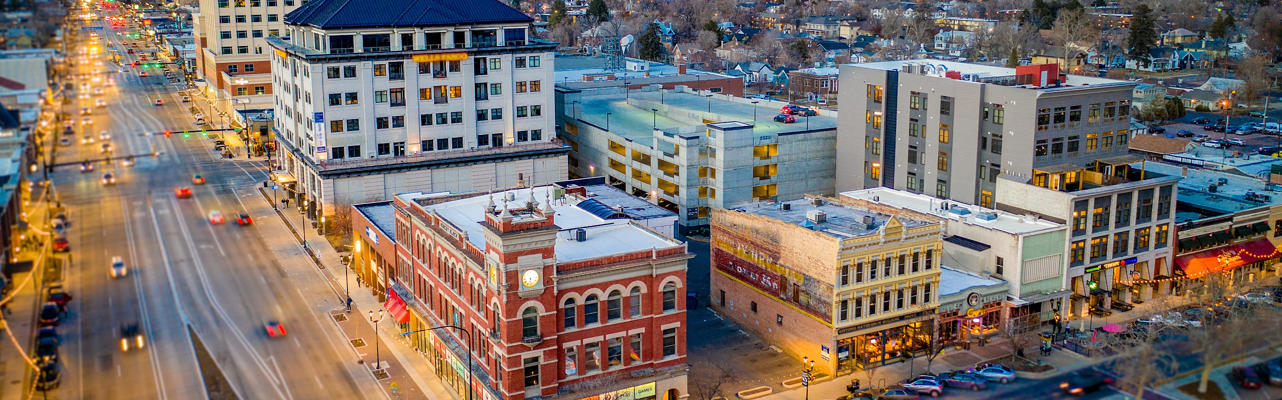 Vibrant urban cityscape showcasing a bustling downtown area with historic architecture and modern buildings.