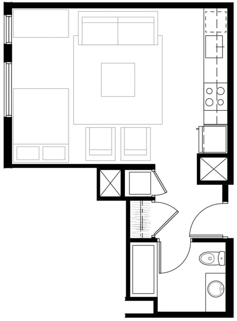 Modern studio apartment floor plan showcasing an open living area, compact kitchen, and a well-appointed bathroom.