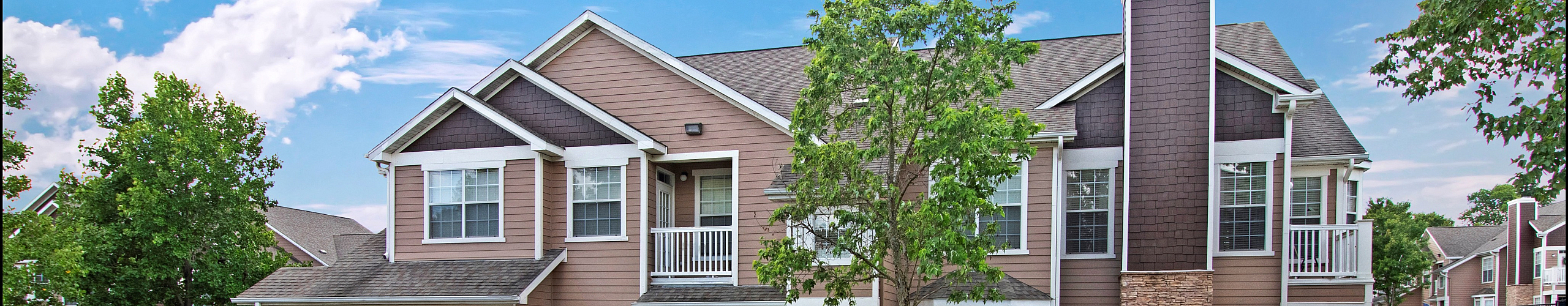 Exterior | The Hamptons at Woodland Pointe Apartments