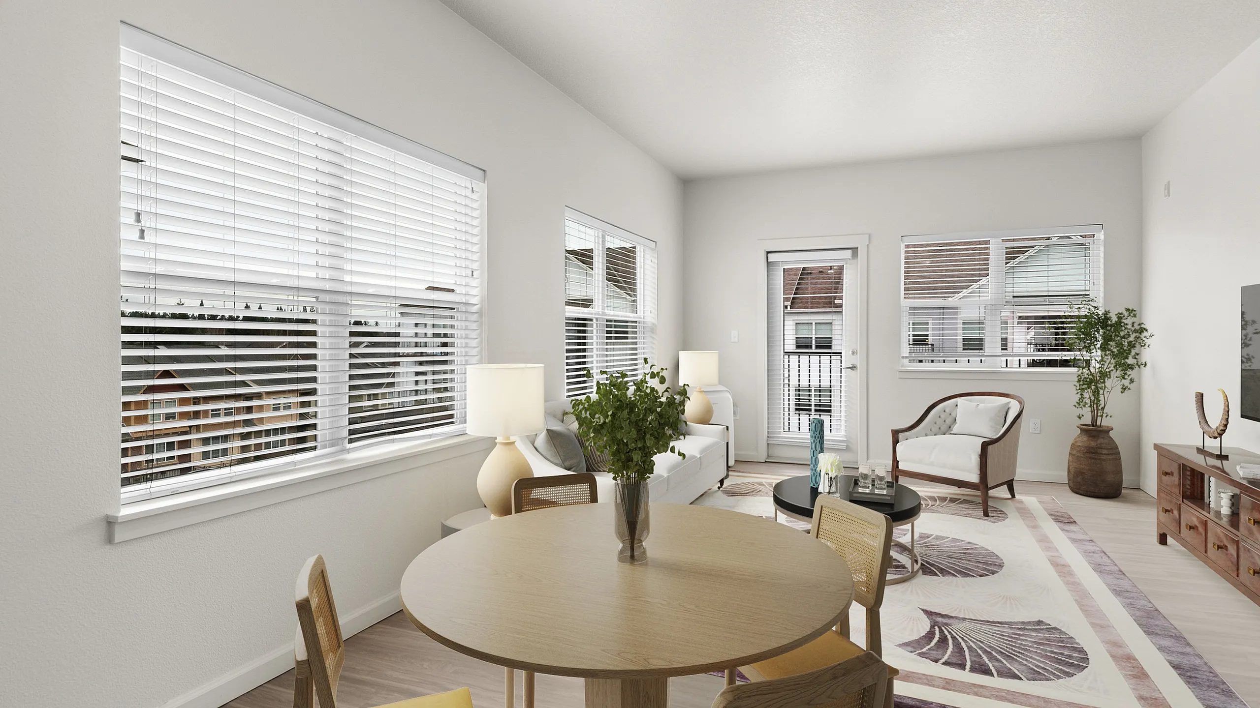 Bright and airy living room with stylish furnishings, large windows, and modern decor offering a comfortable and elegant space.