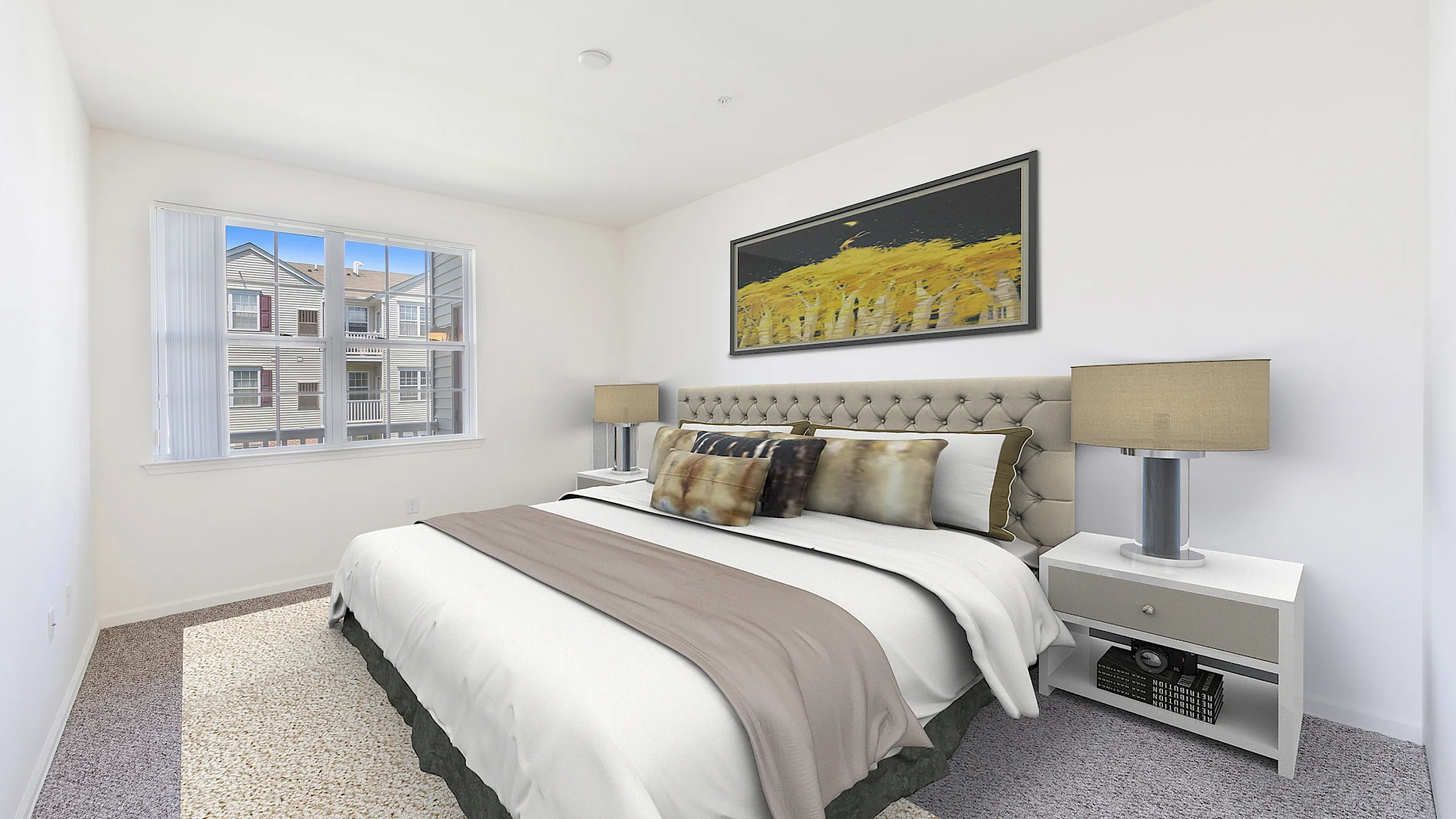 Bright and inviting bedroom with a plush bed, modern decor, and a large window offering scenic views.