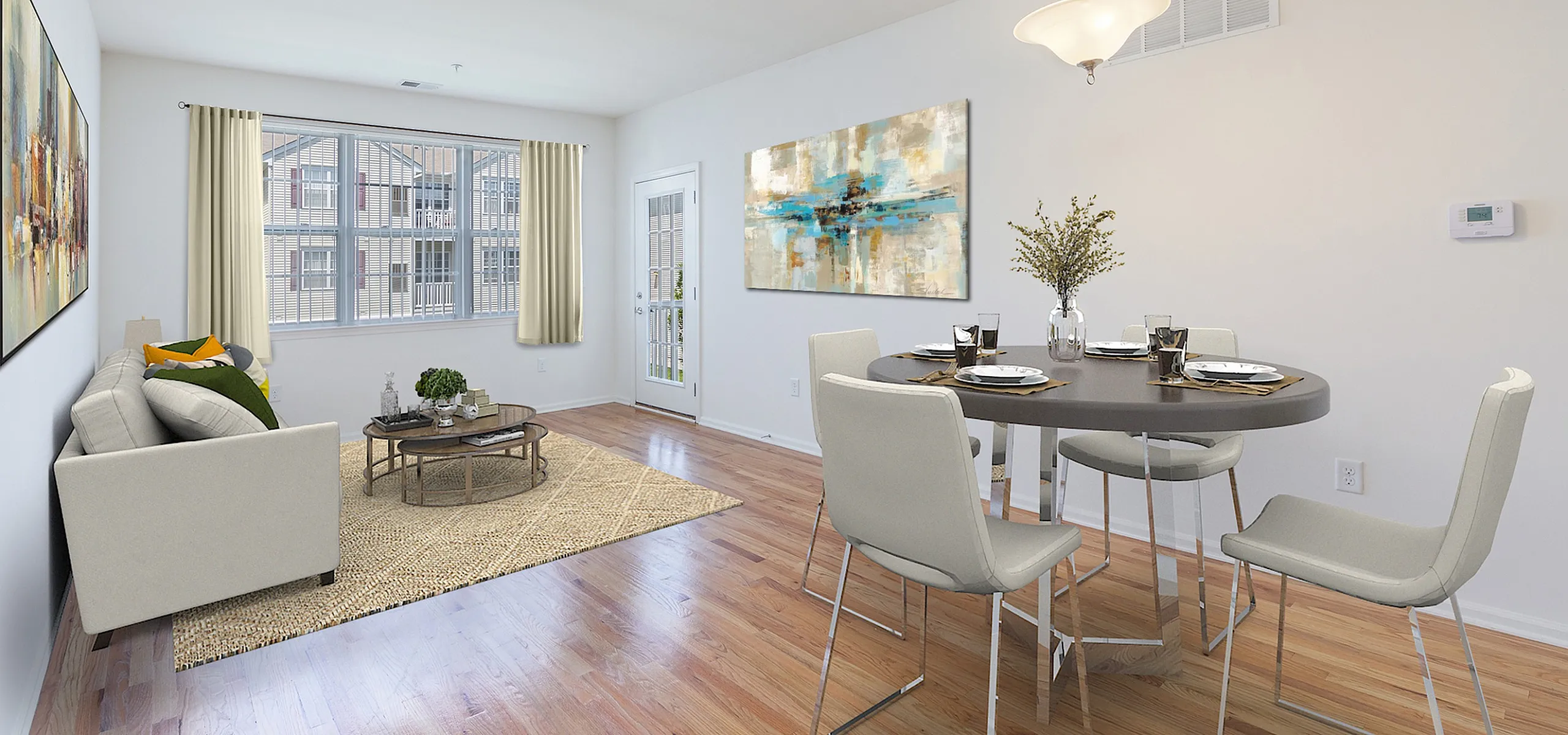 Elegant apartment living and dining area featuring chic modern furnishings, large windows with abundant natural light, and stylish wood flooring.