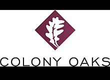 Elegant Colony Oaks logo featuring a stylized oak leaf set in a maroon diamond shape.