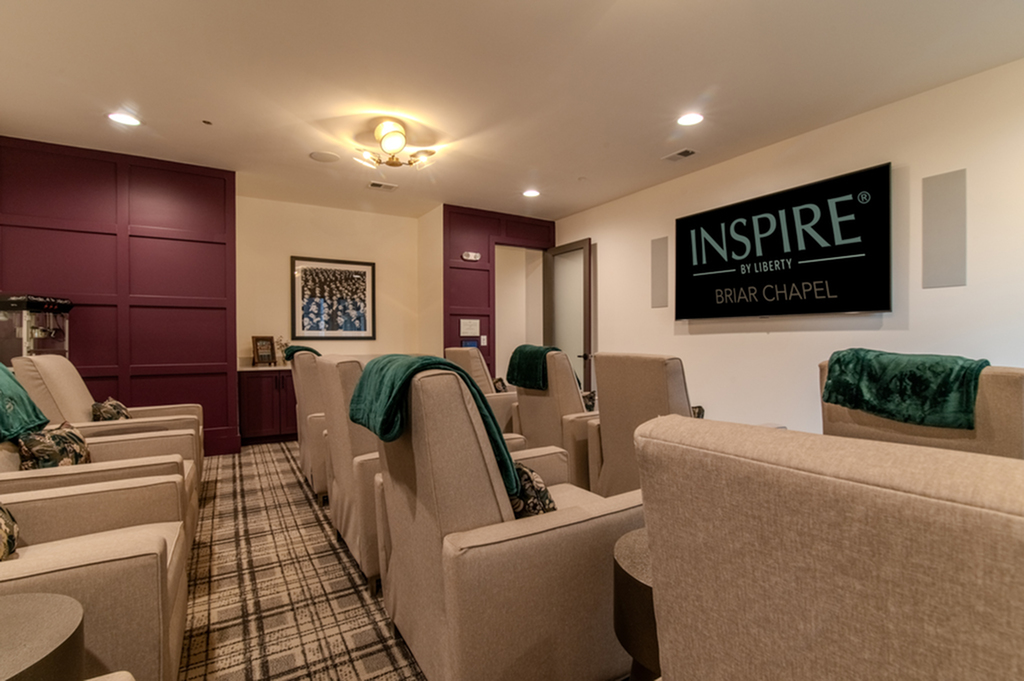 Inviting cinema room with comfortable seating and elegant decor at Briar Chapel.