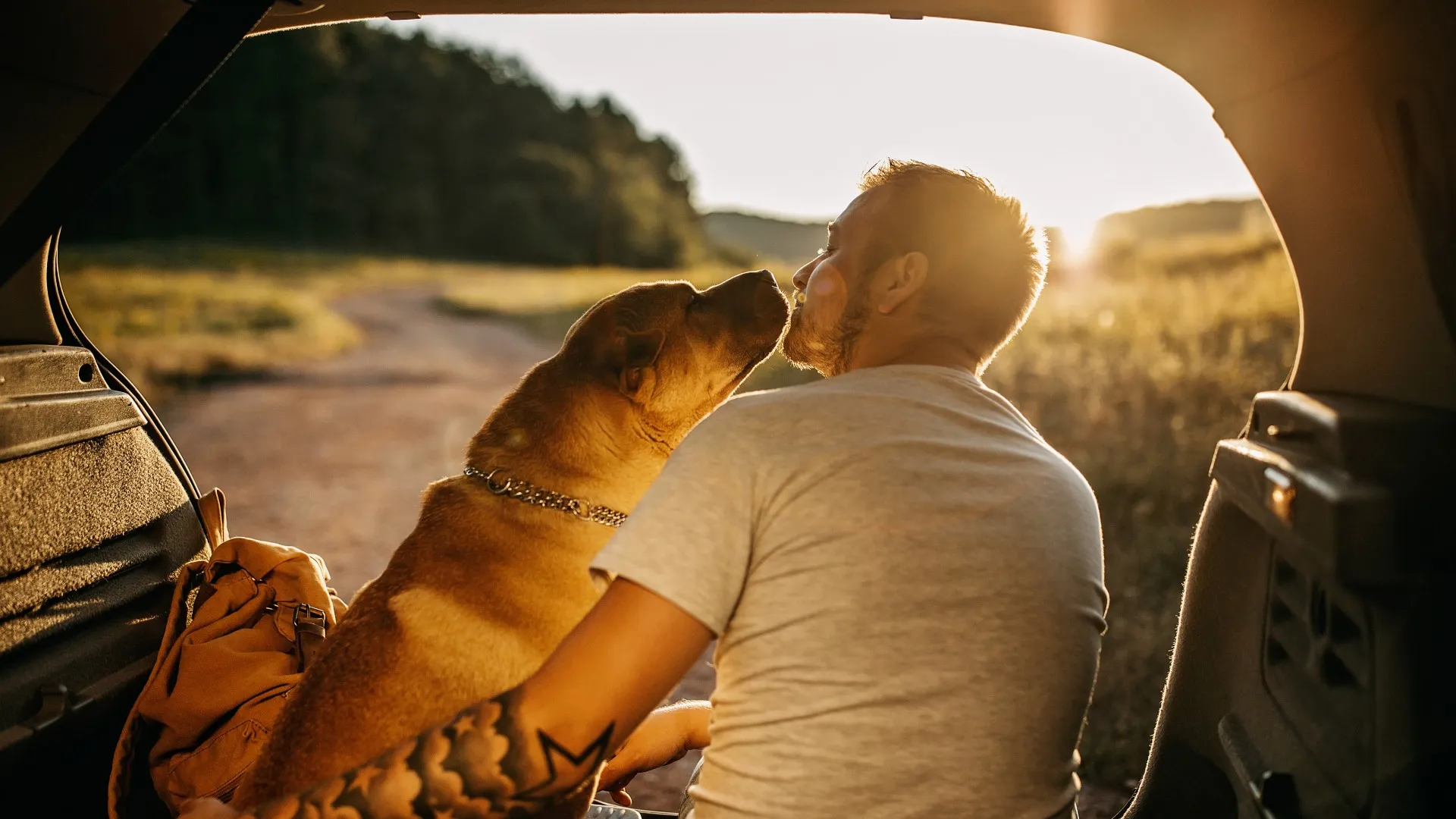 Guy hanging out with dog