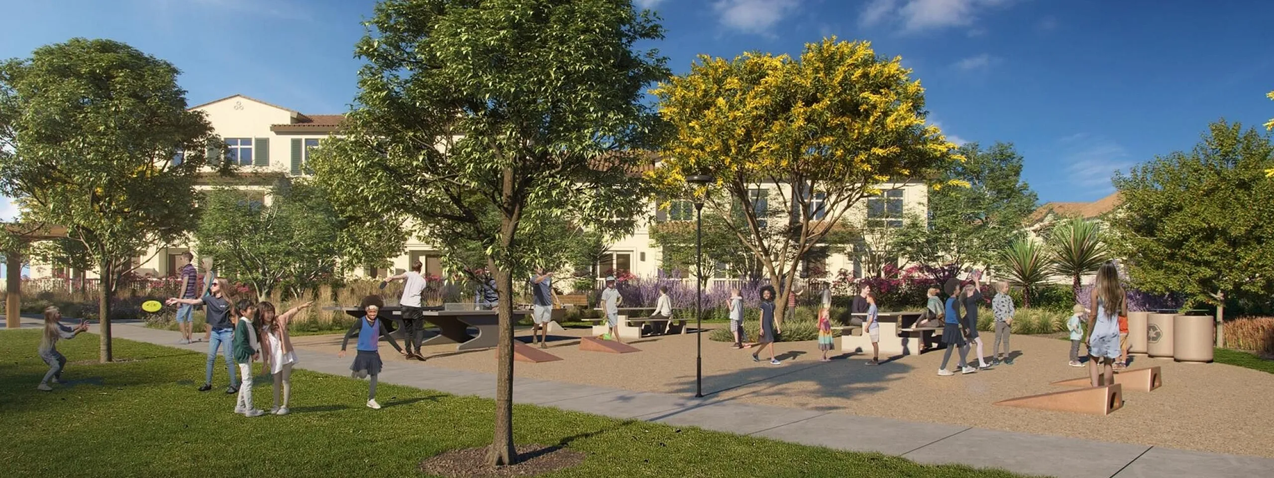 Vibrant community outdoor space with lush greenery, featuring families enjoying activities under a sunny sky.