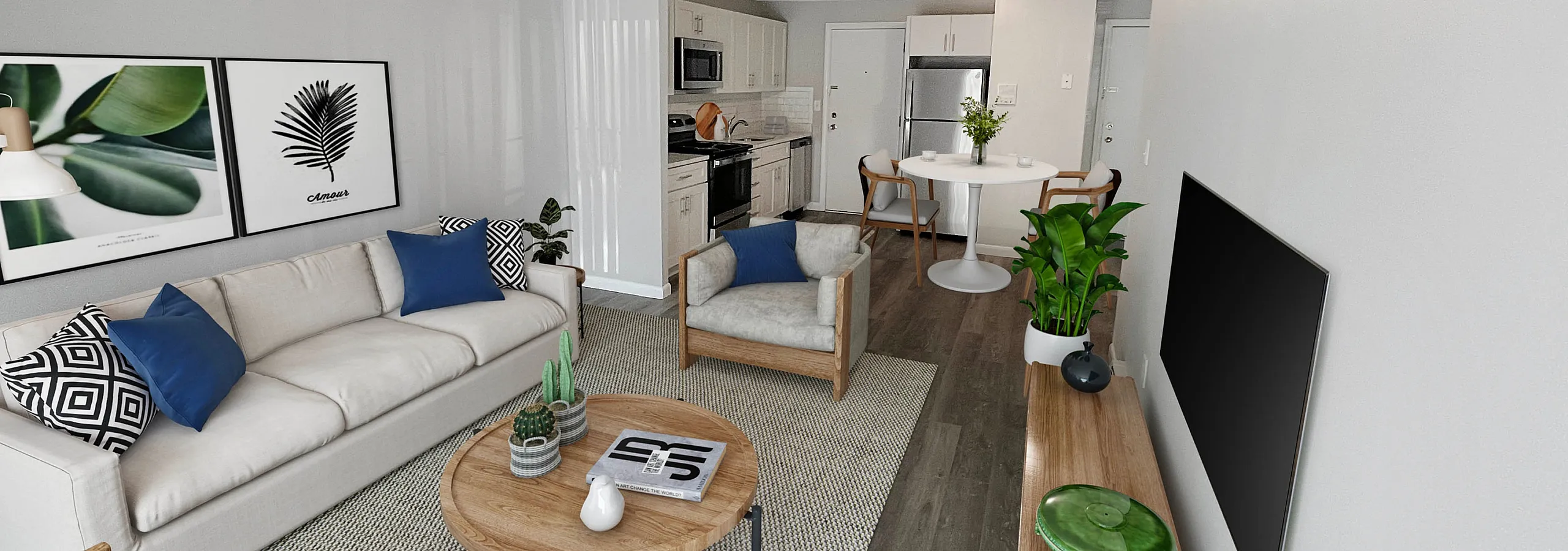 Contemporary living room with stylish furniture, wooden flooring, and open-plan kitchen.