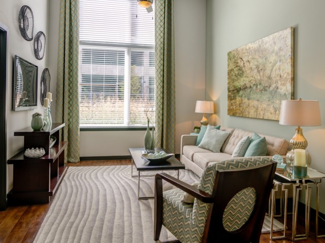 Image of Luxury plank flooring (wood style) in kitchens & living rooms for The Flats at Taylor Place (Moved to RC)