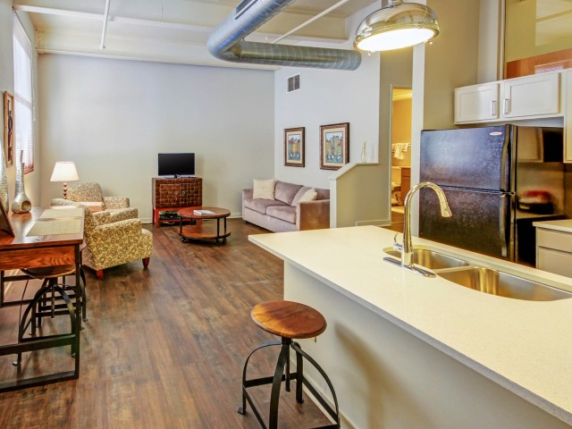 Residents Cooking in the Kitchen | Apartments Homes for rent in Pittsburgh, PA | Heinz Lofts