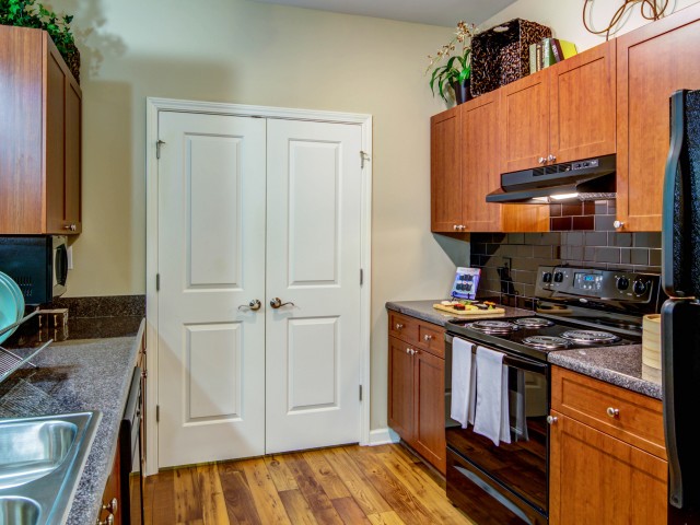 Image of Gourmet Kitchen with Designer Appliances and Custom Cabinetry for Seven Springs (Moved to RC)
