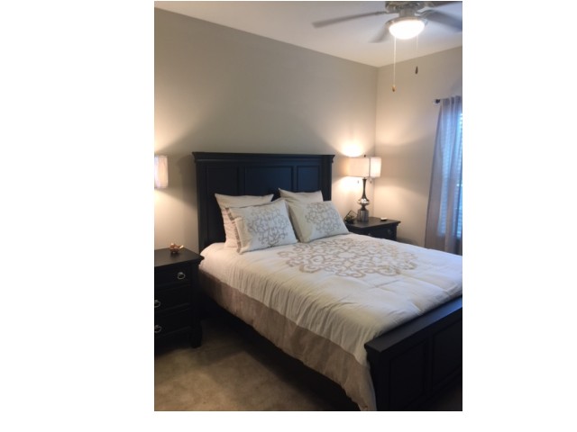 Bedroom with Lighted Ceiling Fan l Monterey Point