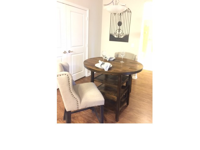 Hardwood Floors showing a Dining Room with Table and Chairs l Monterey Pointe