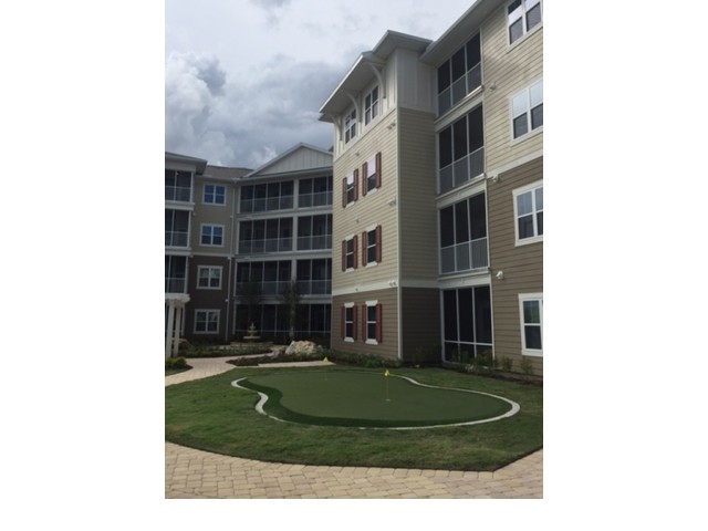 Putting Green surrounded by Monterey Pointe apartments