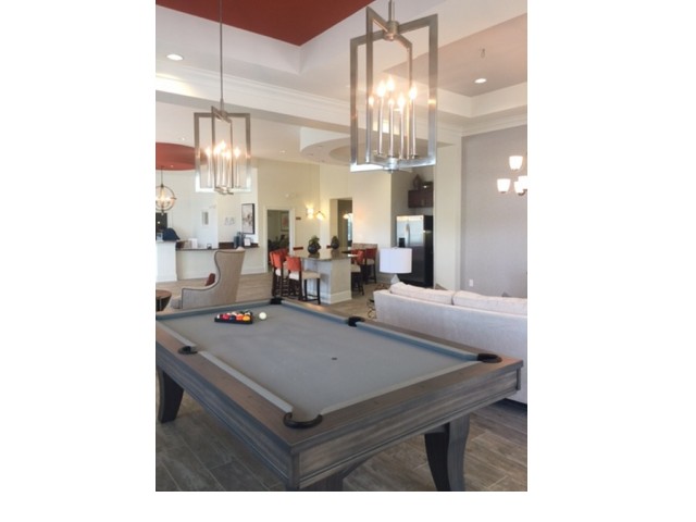 Billiards Lounge with couch and additional seating areas l Monterey Pointe