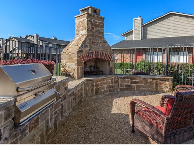 Outdoor Lounge with Fire Pit and Grills