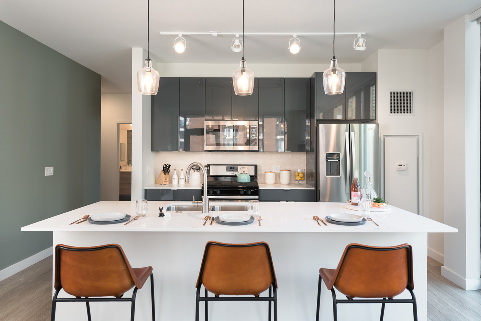 Image of Whirpool stainless steel appliances including refrigerator, gas ranges, built-in microwave, (refrigerators are side by side in the two bedrooms and penthouses) for Aurelien (Closed)