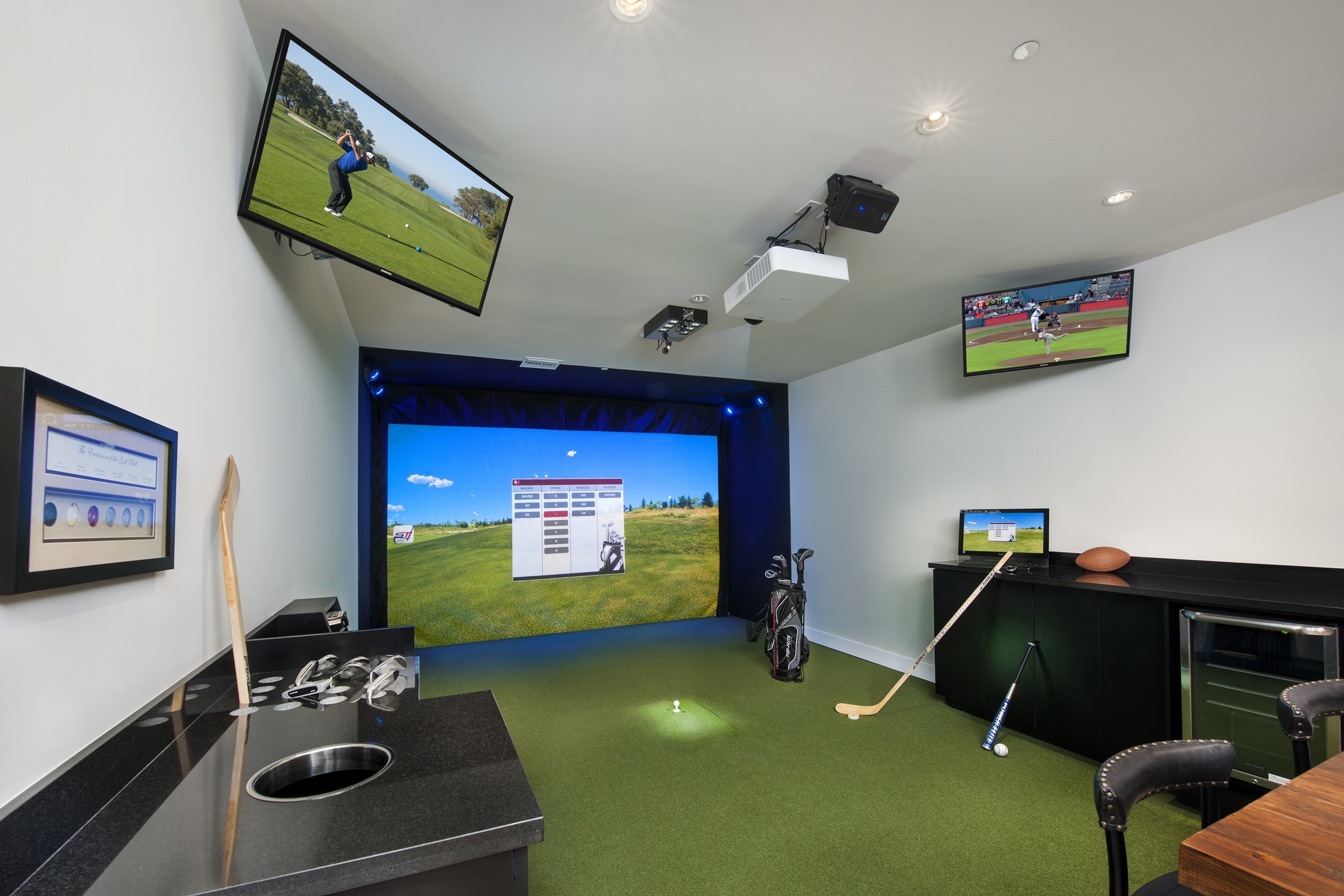 Indoor multi-sport simulator for golf, hockey, baseball, football, soccer and more