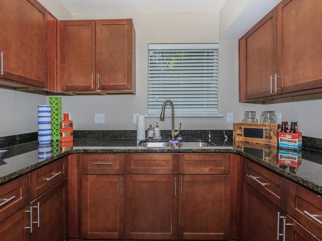 Kitchen with brown wooden cabinets