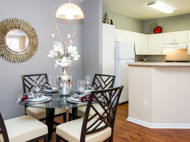 dining and kitchen area with bar seating
