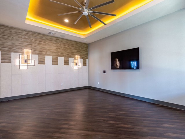 Treviso Grand Apartments - North Venice, Florida  fitness on demand open space with television